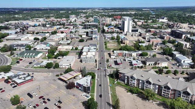 Red Deer, AB, Canada, 4k aerial video footage flying along Highway 2A in Downtown Red Deer City with famous buildings like City Hall. The City is located on Red Deer River between Calgary and Edmonton