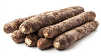 A bunch of black salsify roots, also known as black oyster plant or vegetable oyster, isolated on a white background.
