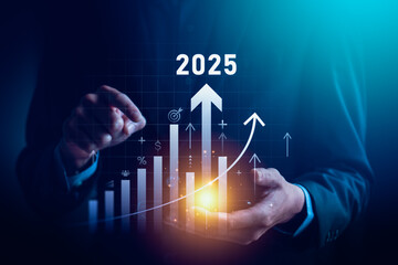 Businessman Analyzing 2025 Growth Trends with Digital Bar Graphs and Arrows Highlighting Financial...