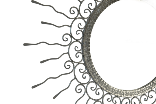 An intricate metal sunburst featuring swirling, ornamental wire rays and a circular, hollow center. The handcrafted design exudes a vintage, artisanal charm, perfect for decorative use.