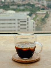 Cup of homemade craft of Iced coffee americano.