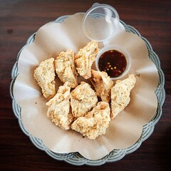 Inside out fried tofu served with chili sauce. Indonesian traditional snack.