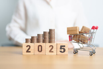 Happy New Year 2025 with shopping cart and money coins stack. online shopping, Marketplace platform...
