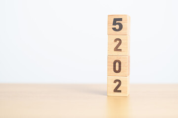 2025 year calendar block on table. goal, Resolution, strategy, plan, start, budget, mission,...