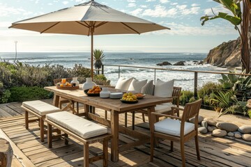 Obraz premium Coastal Dining Table Set with Umbrella and Natural Wood Texture on Ocean-View Patio