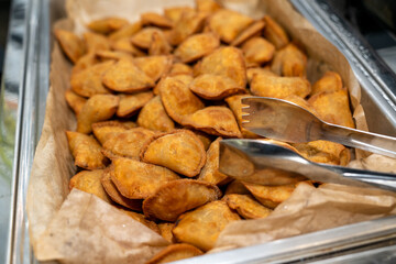 Beef Empanadas appetizer served at a party in metal tray