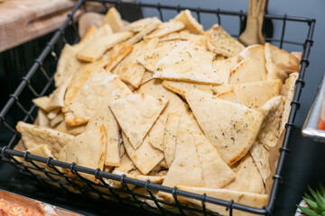 Pita bread triangles ready for dipping