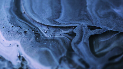 Fluid glitter drip. Bubble paint spill. Defocused blue black white color wet shimmer oil emulsion...