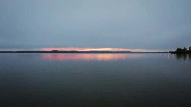 Bird POV Flying from Land out over the Ocean, Sunset Horizon in Sweden