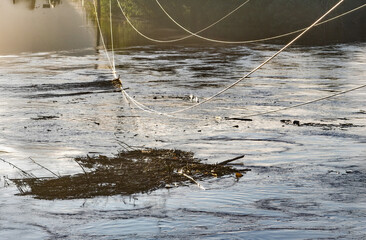 Transmission power lines are touching flood water.heights in river