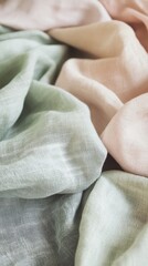 A soft, light pastel linen fabric with a subtle texture, arranged in gentle folds. The fabric's smooth surface and muted tones create a serene backdrop with a wide, unobtrusive copy space area 