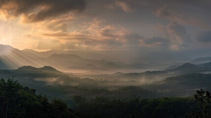 Obraz premium Sunrise Over Misty Mountains
