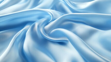 Obraz premium An elegant soft blue silk fabric draped gracefully with a shimmering, satin-like texture. The light color and glossy finish provide a refined and minimalist background with ample space for text 