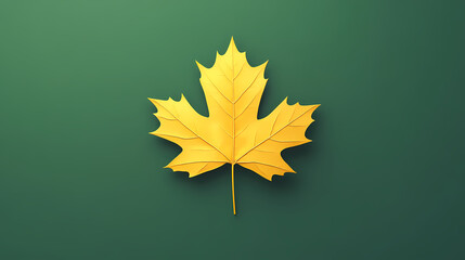 A yellow maple leaf placed on a green background