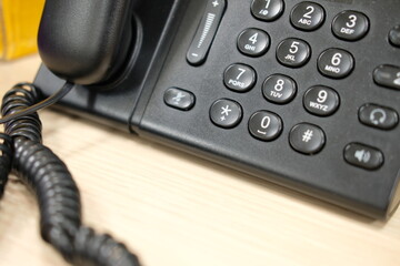 Black telephone on the desk