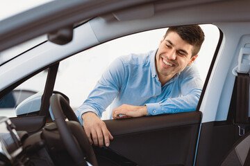 Dream Car. Happy Man Looking At New Auto, View From The Inside Of The Car. Copy Space