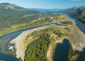A beautiful landscape with a river and a forest