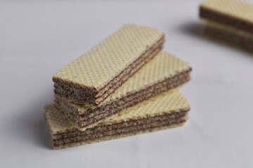 Chocolate flavored wafer biscuits, isolated on a white background.