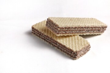Chocolate flavored wafer biscuits, isolated on a white background.