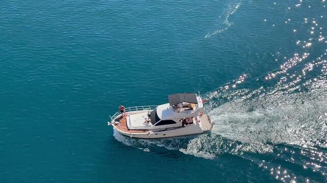 View of a yacht traveling in blue sea