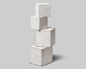 積み上げられた、質感のある白いキューブ