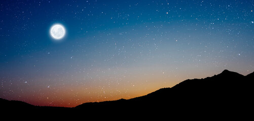 Christmas star shines at night over the mountains of Bethlehem