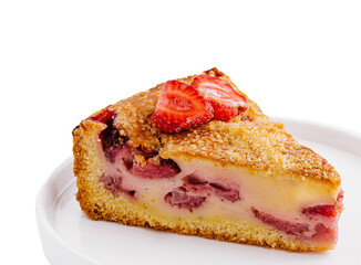 Slice of strawberry cake lying on white plate