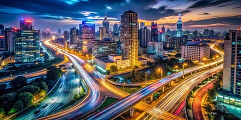 Obraz premium A breathtaking high-angle long exposure captures the urban nightscape, featuring mesmerizing light trails weaving through vibrant city lights,