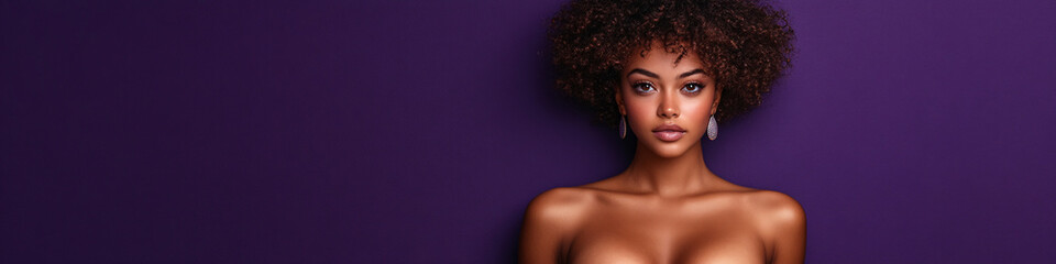Fototapeta premium beautiful woman with curly hair against purple background