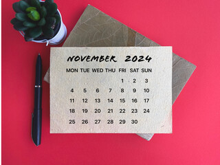Month, time and calendar concept. Calendar for month of NOVEMBER  2024. On blurred styled...