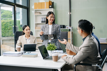  Young business creative team are brainstorming planning discussing while sitting in creative business discussing work