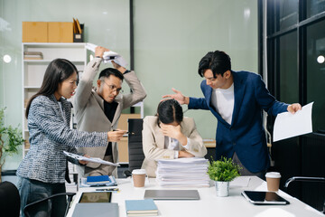 workplace stress and conflict with this intense scene of professionals in a heated office discussion