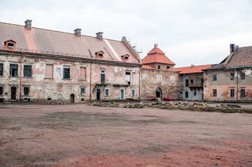 Abandoned Elegance: The Crumbling Facade of a Forgotten Manor