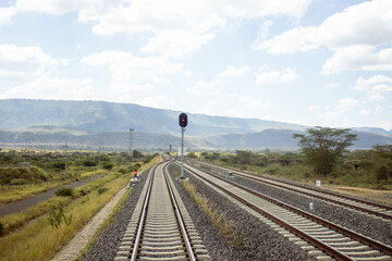 Fototapeta na wymiar A view of railway tracks passing through the countryside