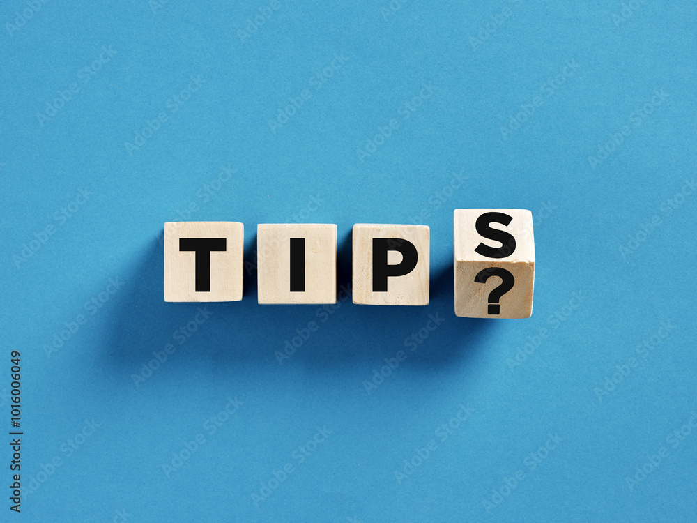 Poster tips question being asked using letter cubes