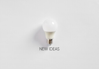 Light bulb is casting shadow over new ideas phrase