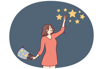 Happy woman collects stars from sky and folds bag for metaphor for finding success and good luck in life. Dreamy girl reaches for stars in hope of getting closer to fulfillment of innermost desires