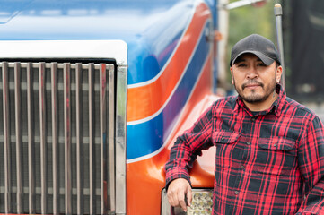 Portrait of truck driver outside the truck