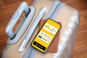 phone with taxi call app on screen background suitcase airport