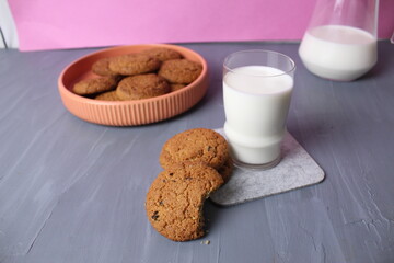 Oatmeal cookies with cereals on a gray background. Homemade pastries. Healthy snack