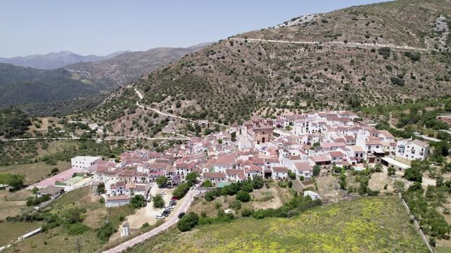 Admire the beauty of a scenic mountain village in Spain captured from an aerial perspective, Alpandeire, Malaga, Andalucia, Spain