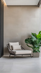 Contemporary lounge chair beside lush green plant in a modern indoor space