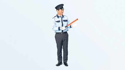 交通整理する男性警備員の全身写真