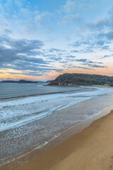 Sunrise seascape with low clouds