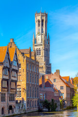 Obraz premium Houses and tower Belfort in Bruges, Belgium