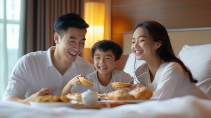 A joyful family sharing breakfast together in a cozy hotel room on a sunny morning
