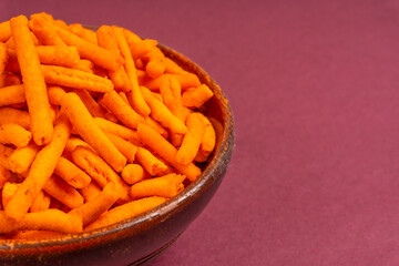 Indian Snacks, Traditional Indian deep fried salty dish called chivda or mixture or farsan made of gram flour and mixed with dry fruits and roasted nuts with salt, pepper, pulses, spice and green peas