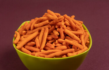 Indian Snacks, Traditional Indian deep fried salty dish called chivda or mixture or farsan made of gram flour and mixed with dry fruits and roasted nuts with salt, pepper, pulses, spice and green peas