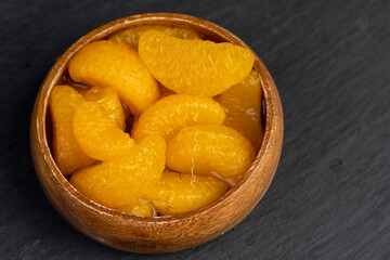 peeled orange tangerines marinated in sugar syrup