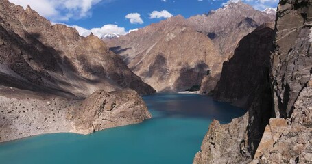 Bright Blue Waters of Attabad Lake Hunza Valley in Northern Pakistan. Summer Day